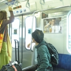 Subway arrival in Tokyo, Japan: Carmen Fraser (Left) and Oda-San (Right)