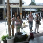 Demonstration of using the women's fountain by Hiromi-San