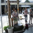 Demonstration of using the women's fountain by Hiromi-San